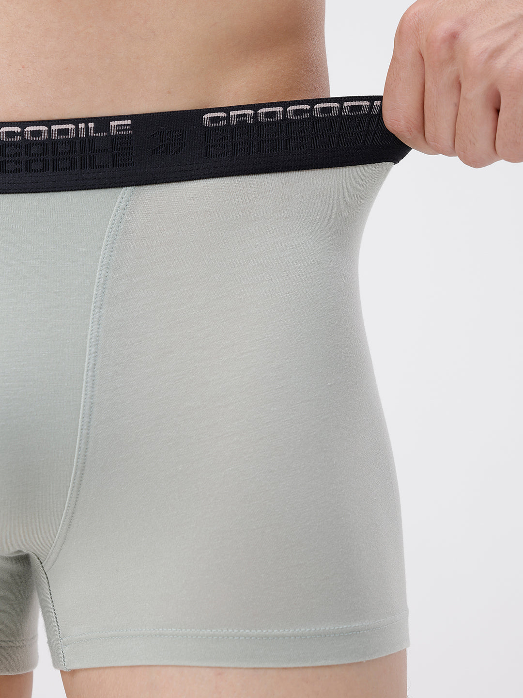 Gray athletic shorts with black waistband featuring 'Crocodile' branding.