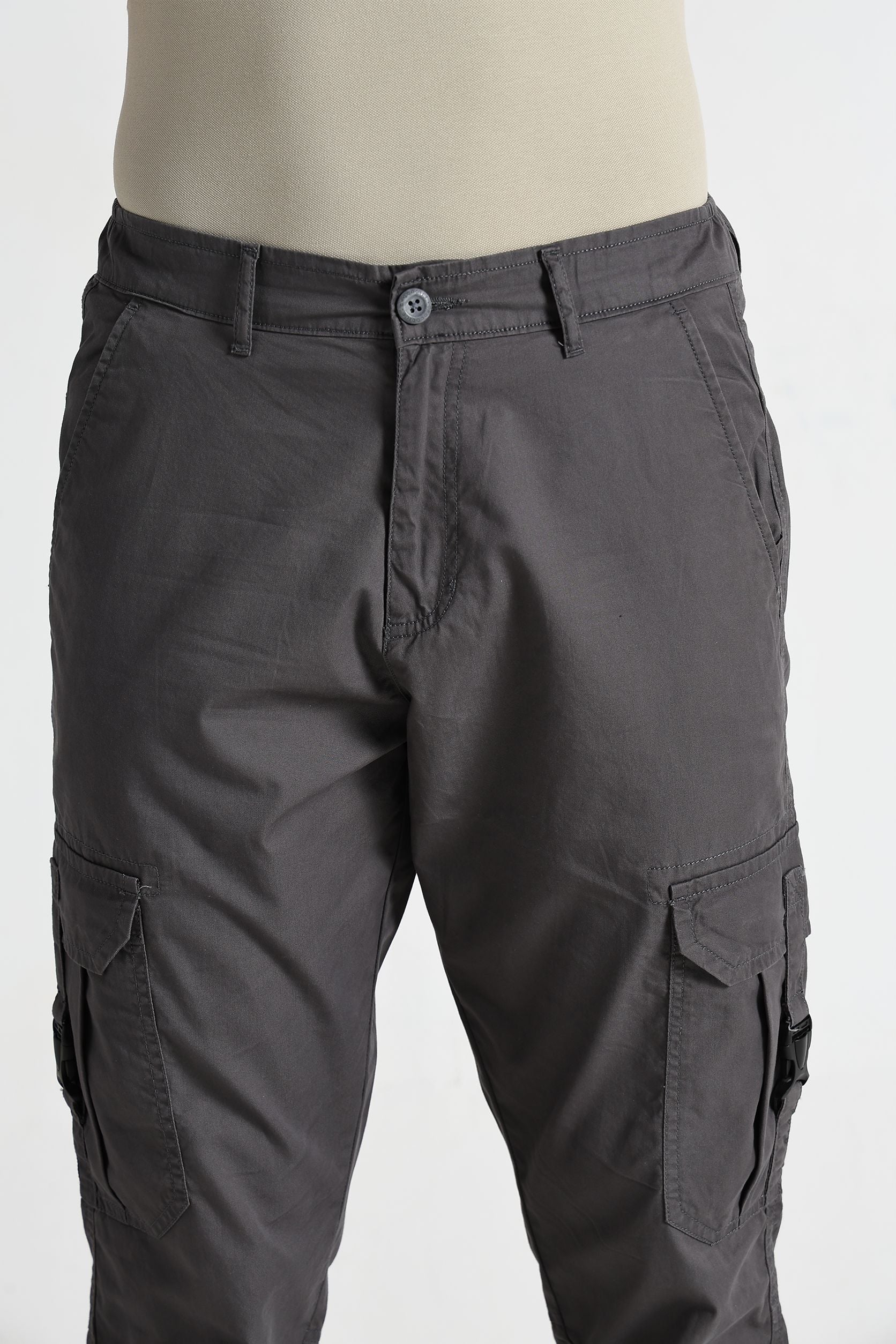 Dark gray cargo pants on a white background