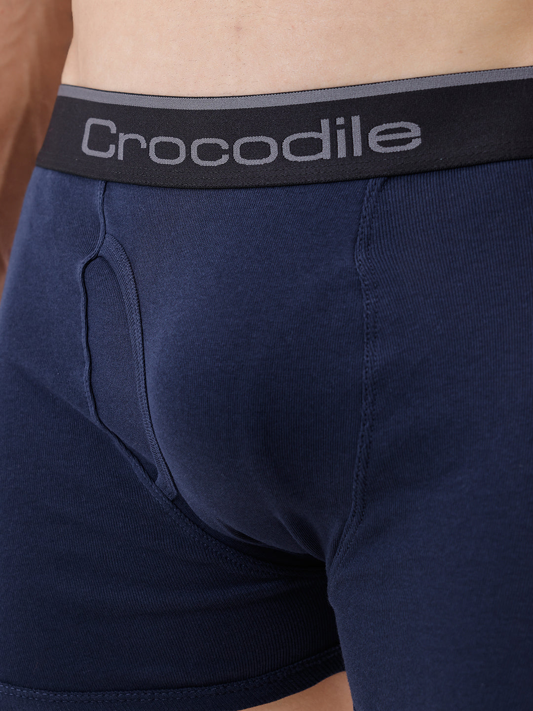 Navy blue boxer briefs with a black waistband featuring 'Crocodile' branding.