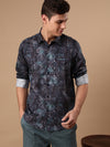 Man wearing a navy printed full sleeve 100% cotton navy casual shirt on a light gray background
