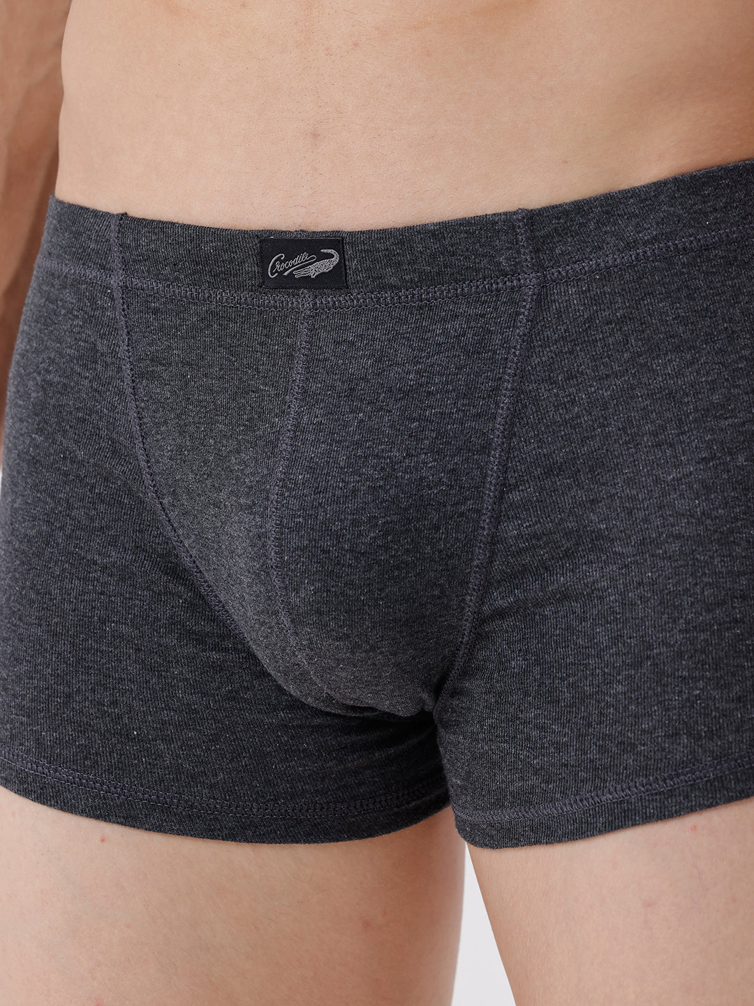 Dark gray boxer briefs with a brand logo on a neutral background