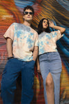 Man wearing a dyevibes over sized crew in multi on a light gray background
