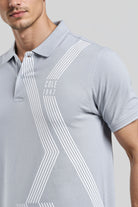 Gray polo shirt with white stripes and 'Cole 1847' branding on a plain background