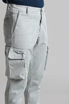 Light gray cargo pants on a plain background