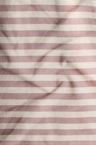 Close-up of fabric with pink and white horizontal stripes