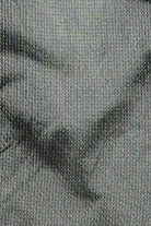 Close-up of a textured gray fabric surface