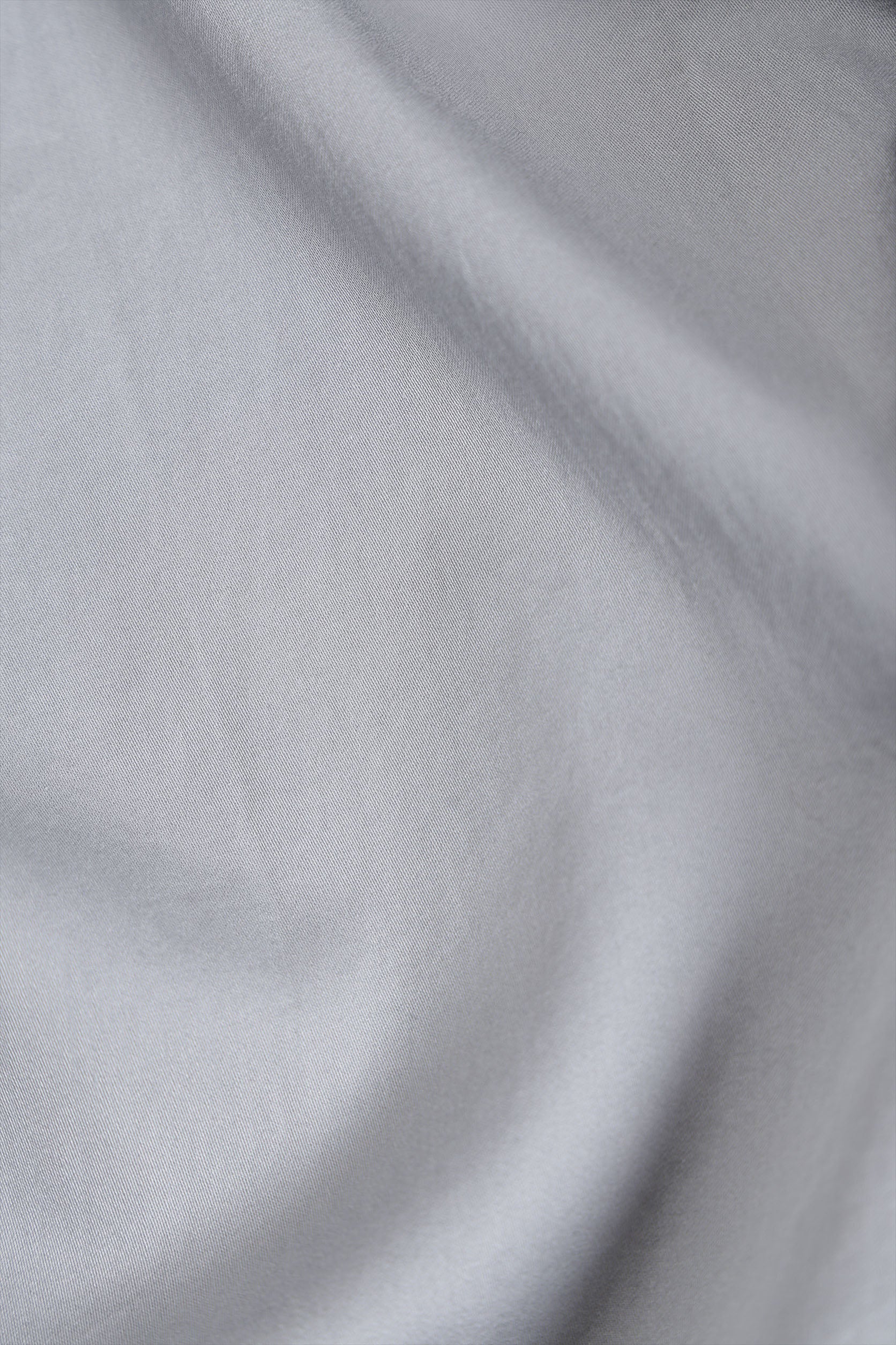 Close-up of gray fabric with a subtle pattern