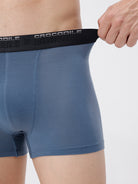 Blue boxer briefs with a black waistband featuring 'Crocodile' branding.
