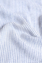 Close-up of blue and white striped fabric texture