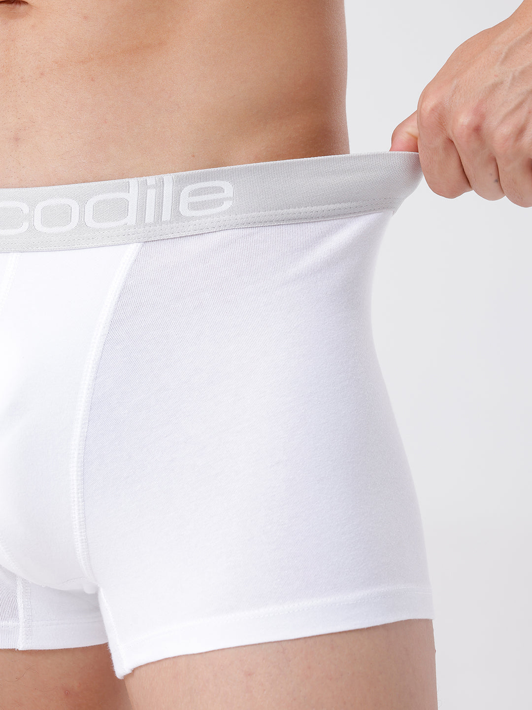 White boxer briefs with a visible brand logo on a plain background