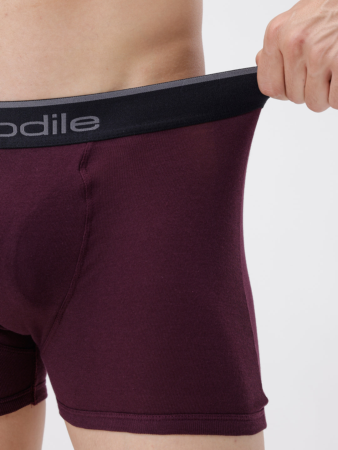 Maroon boxer briefs with a visible brand logo on a plain background