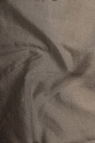 Close-up of textured brown fabric