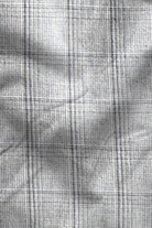 Close-up of a textured fabric with a grid pattern