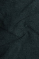Close-up of dark green fabric texture