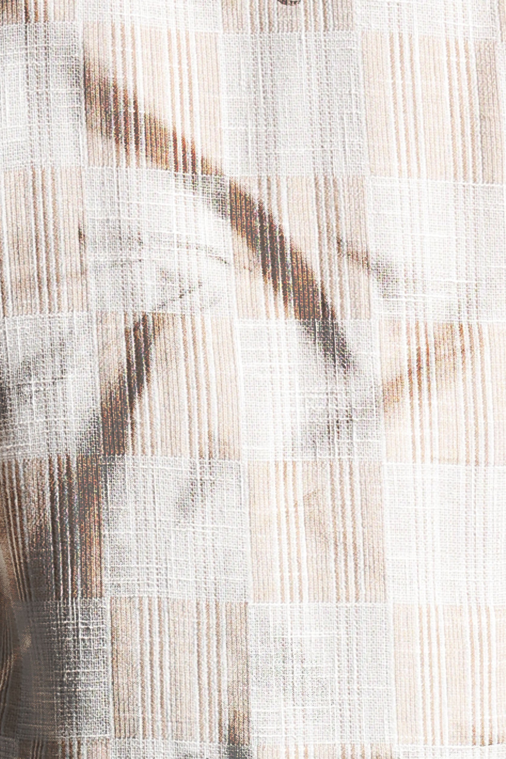 Close-up of woven fabric with a neutral color palette