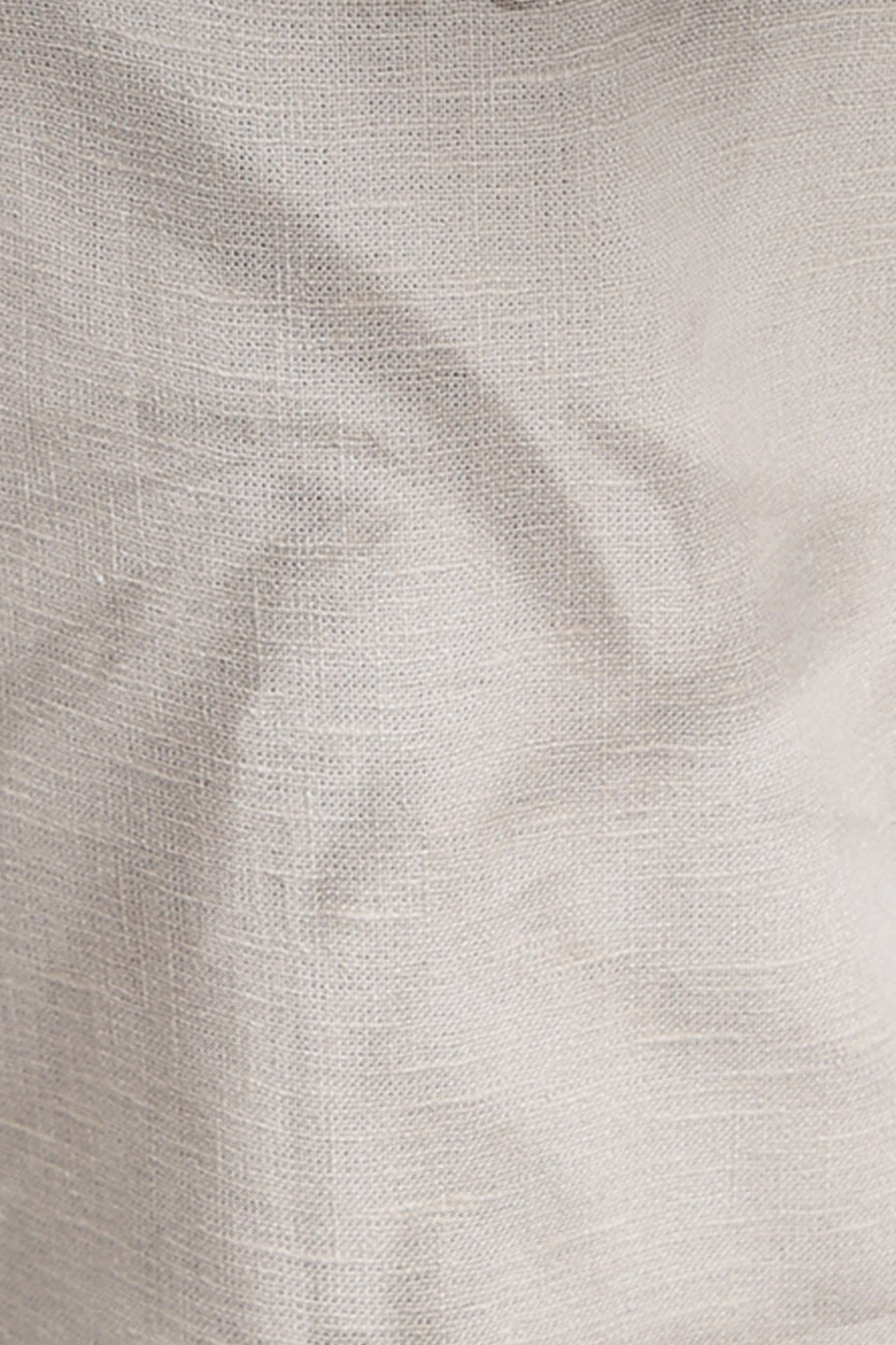 Close-up of textured beige fabric