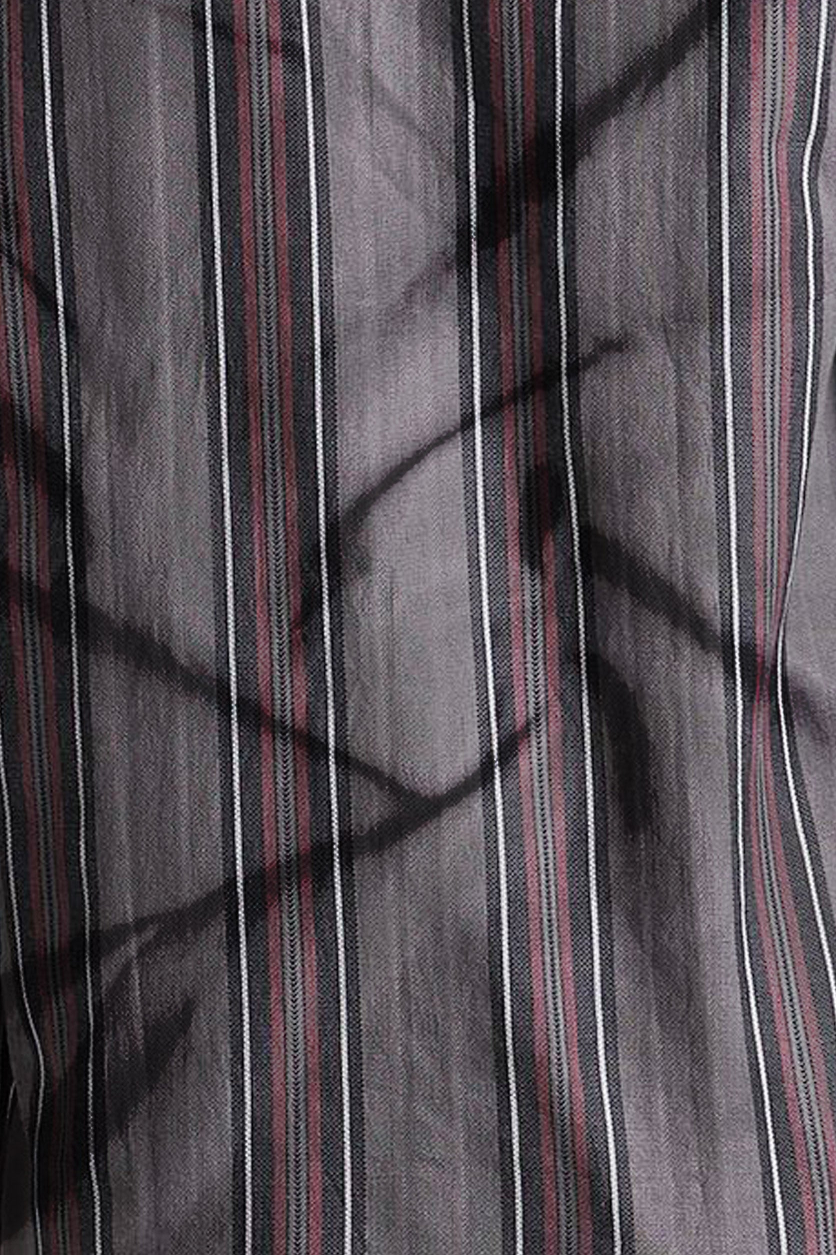 Close-up of striped fabric with dark and light vertical lines.