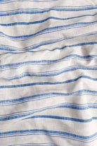 Close-up of fabric with blue and white horizontal stripes