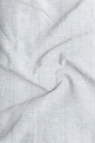 Close-up of textured light gray fabric