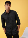 Man wearing a black black printed casual full sleeve 100% cotton shirt with casual styling on a gray background