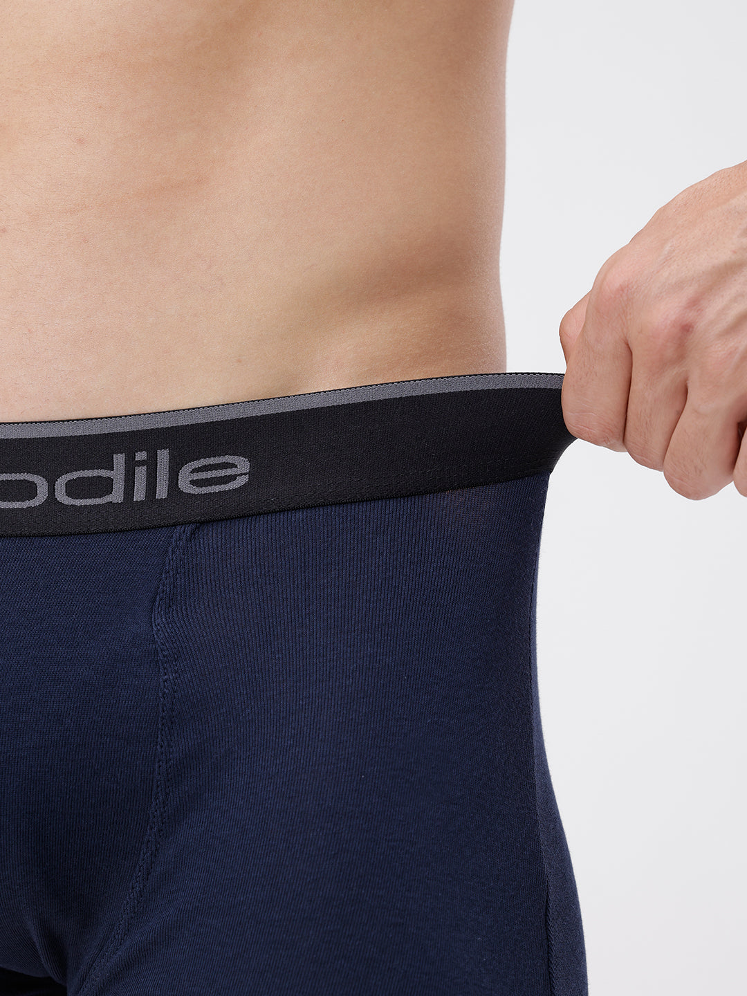 Navy underwear with a visible brand logo on a plain background