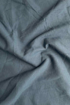 Close-up of textured blue fabric
