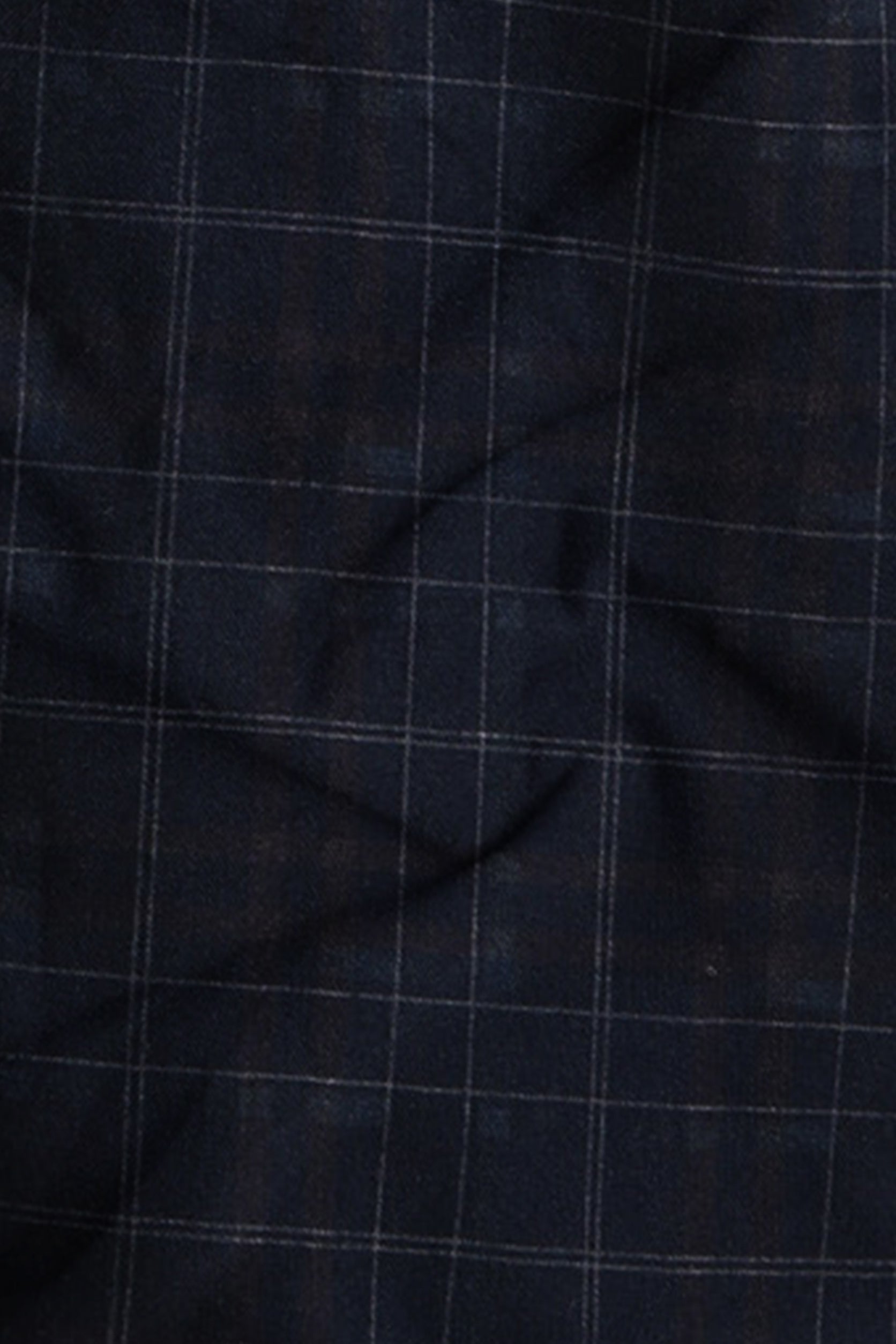 Close-up of dark blue fabric with a subtle check pattern