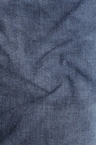 Close-up of blue denim fabric texture