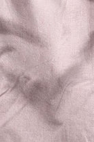 Close-up of a textured pink fabric surface