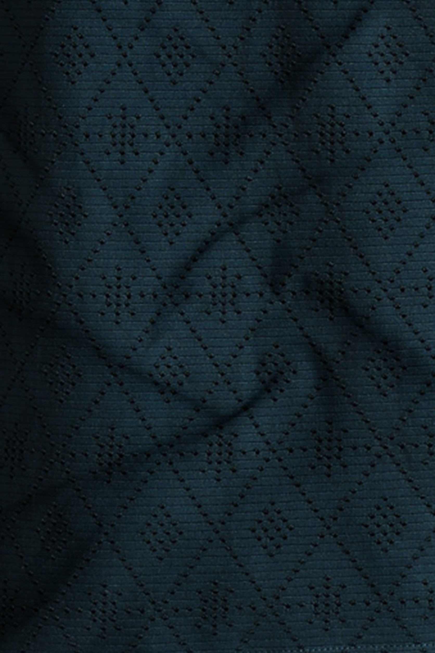 Dark blue fabric with a diamond pattern