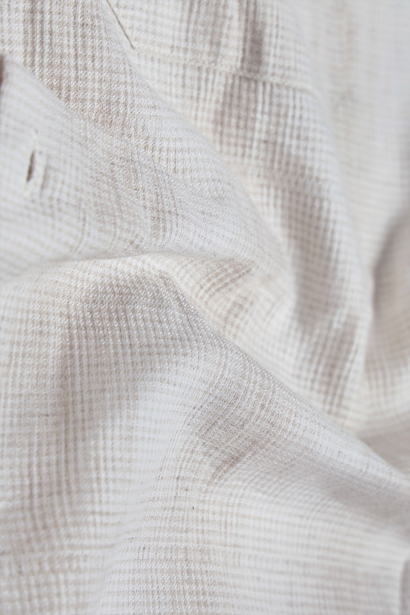 Close-up of textured white fabric