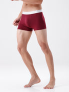 Maroon boxer briefs with white waistband on a white background