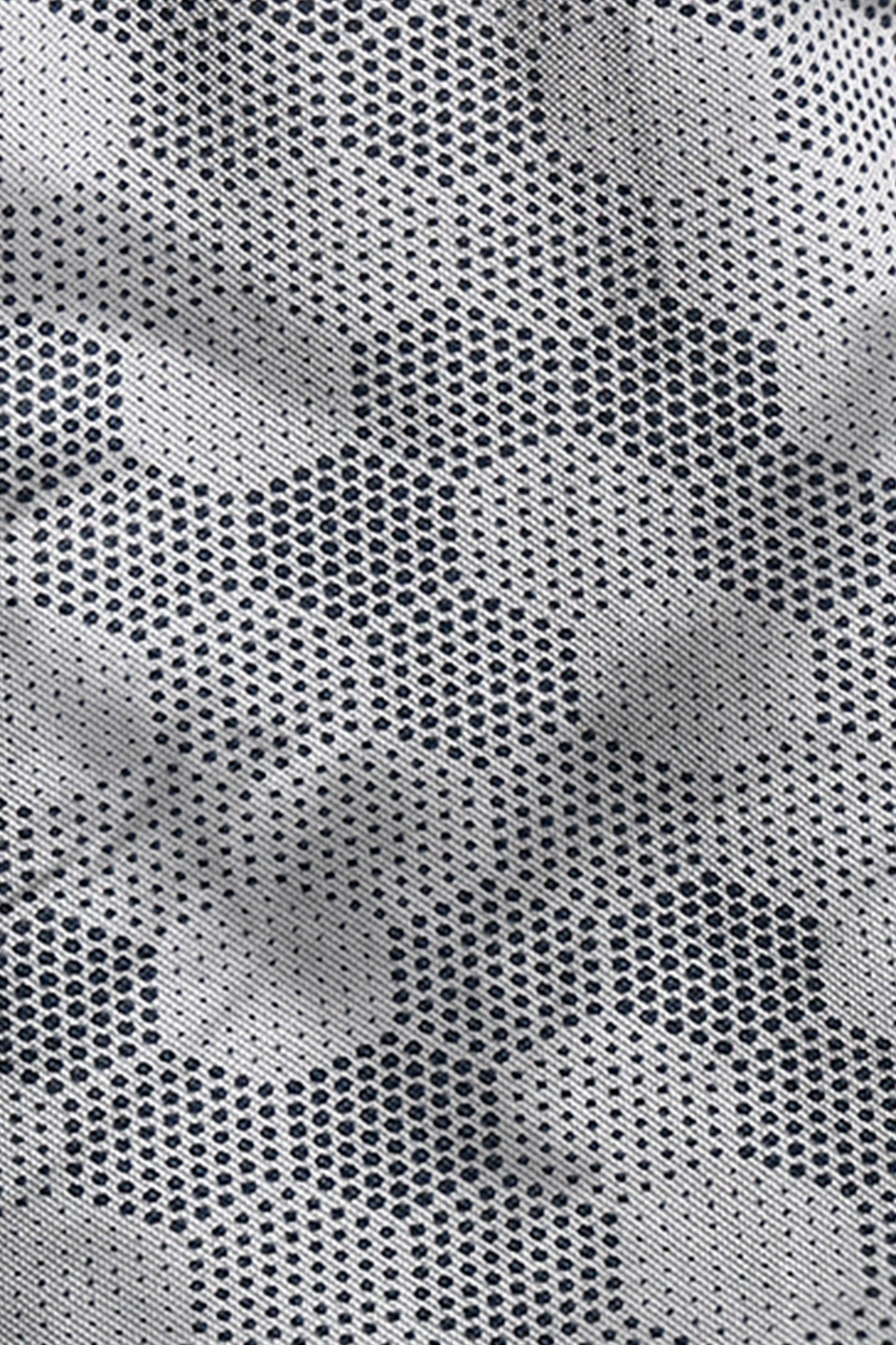 Close-up of a textured fabric with a geometric pattern