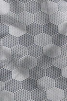 Close-up of a textured fabric with a geometric pattern