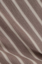 Close-up of brown fabric with a textured pattern