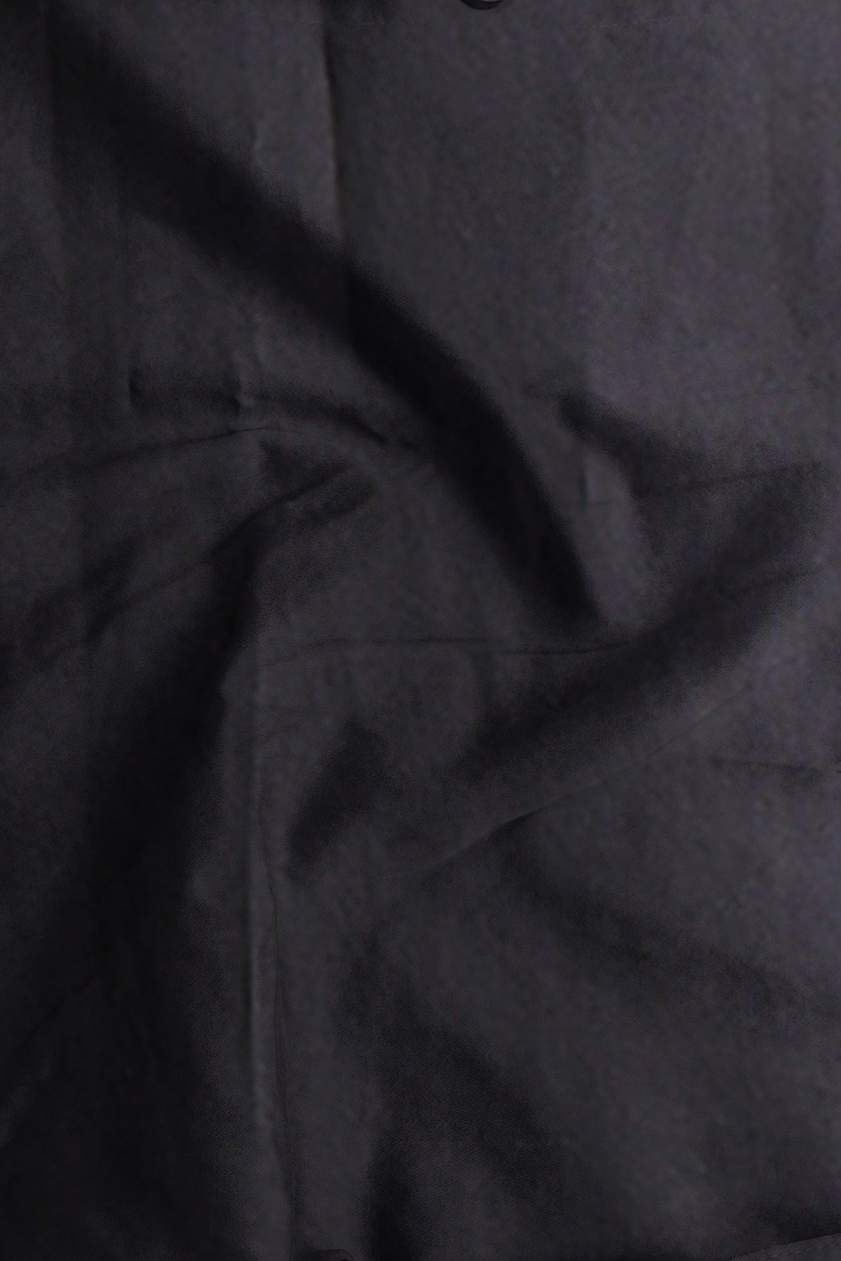 Close-up of dark gray fabric texture