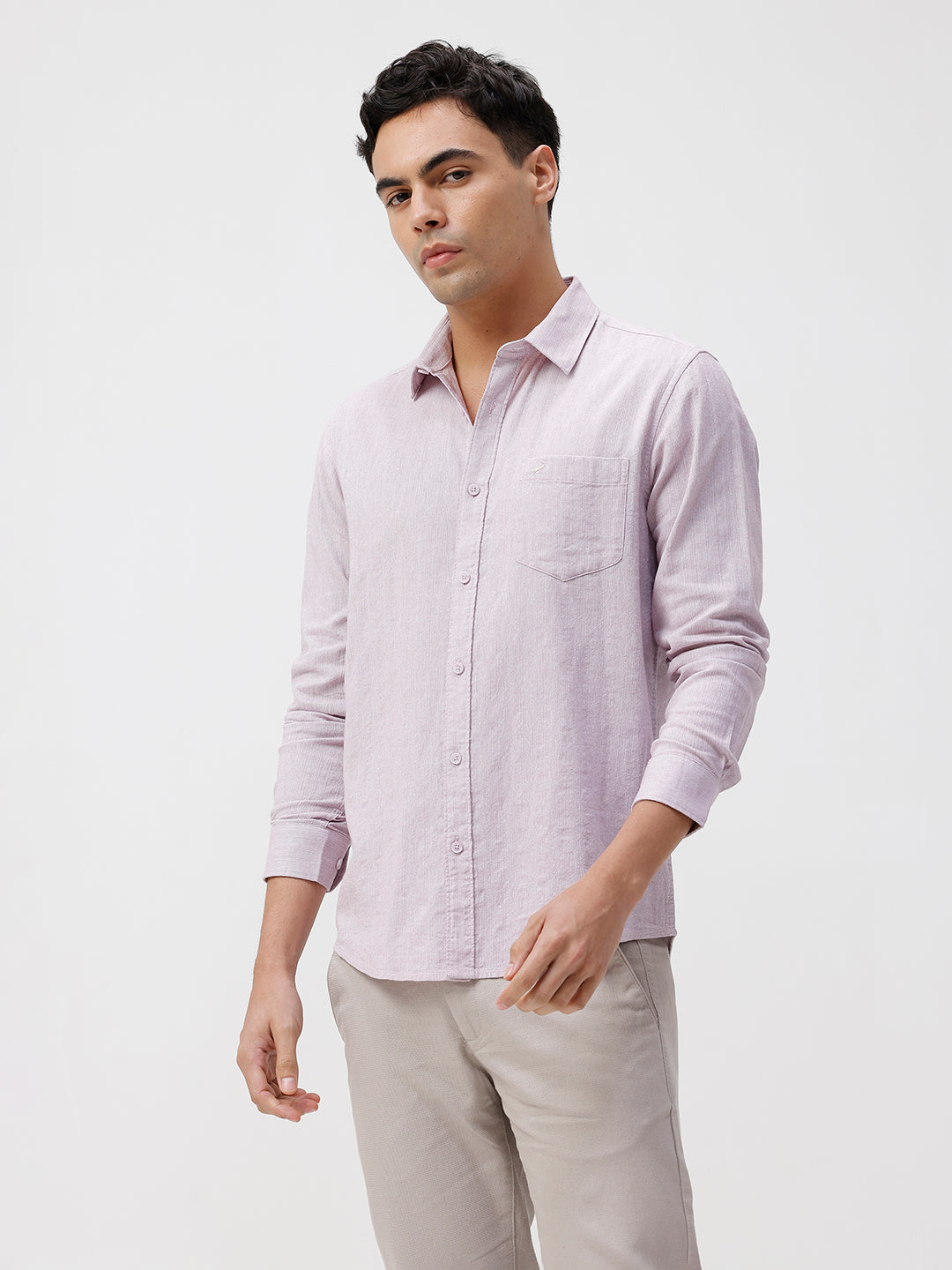 Man wearing a red rib textured cotton shirt light purple on a light gray background