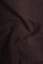 Close-up of dark brown fabric texture