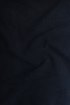 Close-up of dark blue fabric texture