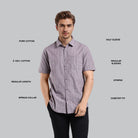 Man wearing a purple checkered shirt with text labels on a gray background