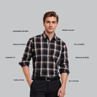 Man wearing a plaid shirt with text labels on a gray background