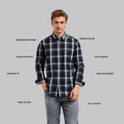 Man wearing a black and gray plaid shirt with text labels on a gray background