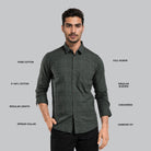 Man wearing a dark green checkered shirt with text describing features on a gray background