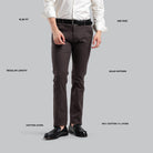 Brown pants with label details on a gray background