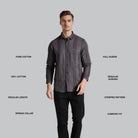 Man wearing a striped shirt with text describing features on a gray background