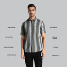 Man wearing a gray striped shirt with text describing features on a gray background