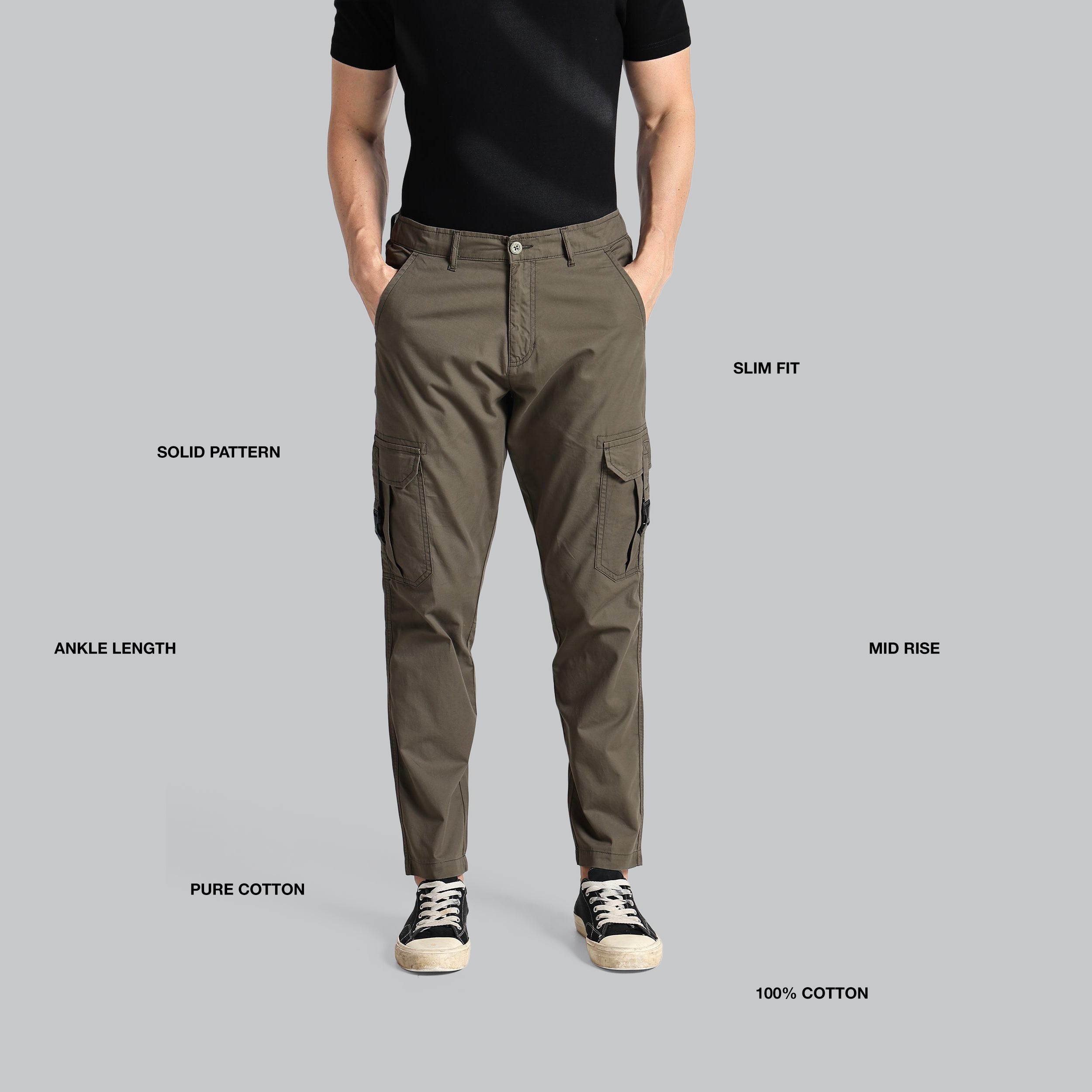 Person wearing olive green cargo pants on a gray background with feature text.