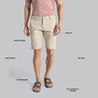 Beige shorts worn by a person on a gray background with text labels.