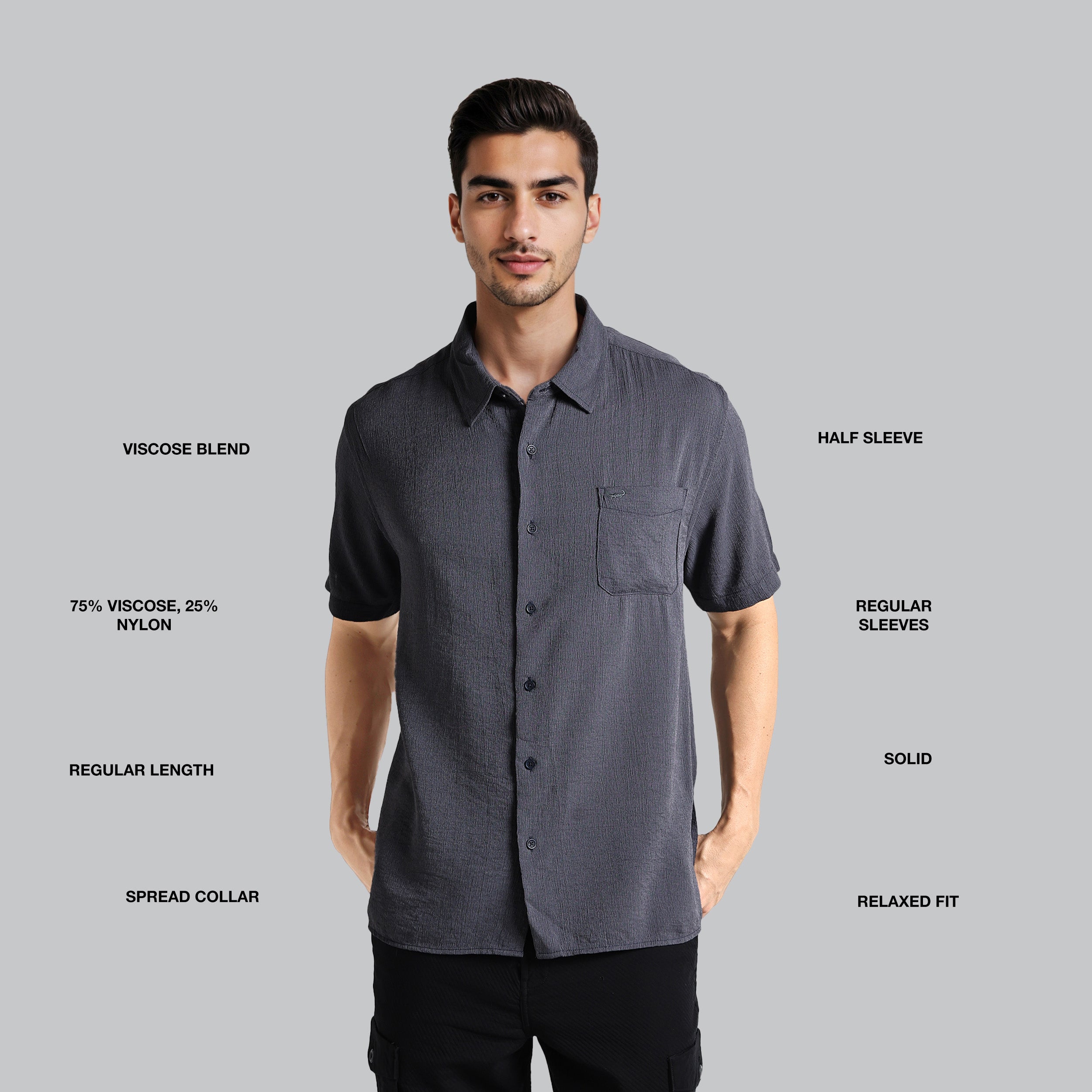 Man wearing a gray short-sleeve shirt with text detailing fabric blend, sleeve length, and other features on a gray background.