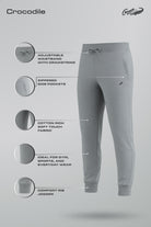 Gray jogger pants with features listed on a gray background